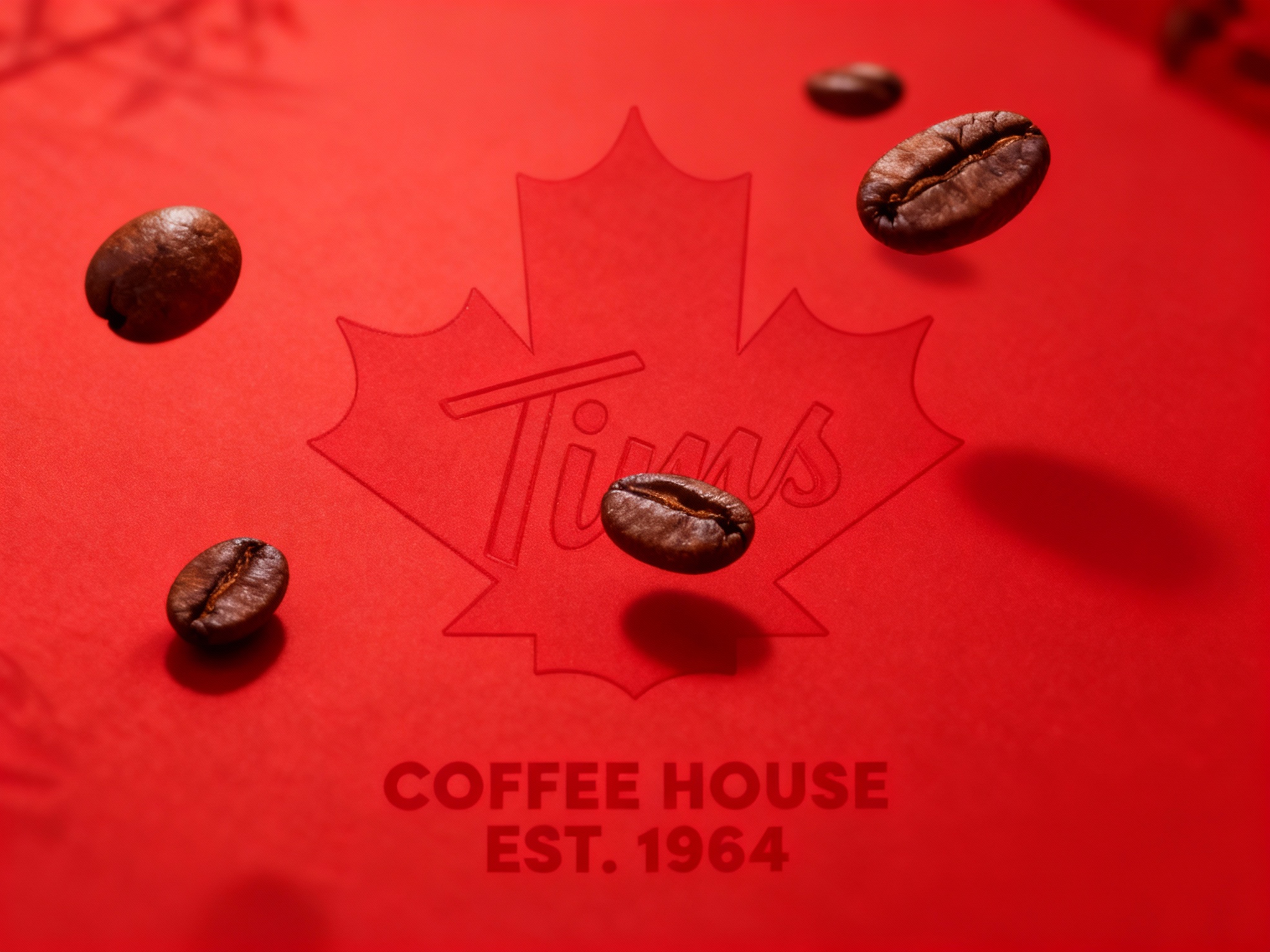 东方美学写实封面大片，几粒非常精致的咖啡豆漂在空中品牌色背景。整个画面呈现仰拍的摄影视角，将咖啡豆线（将参考图中的LOGO）形状完美呈现，仿佛在讲述一个关于时尚与独立的故事，品牌色背景上漂浮着几粒咖啡豆，LOGO以线条形式巧妙融入其中。