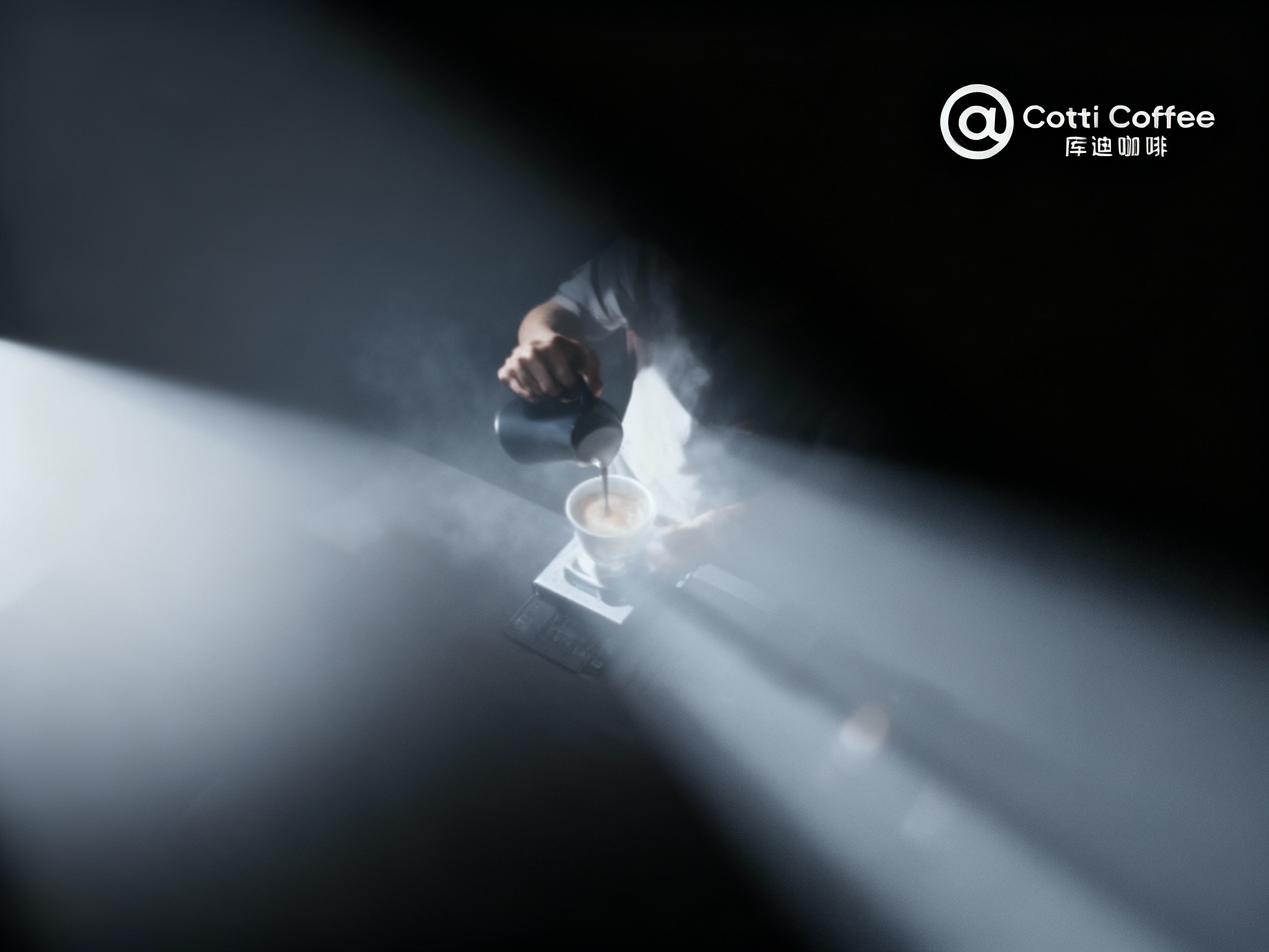 设计品牌宣传海报，画面干净，（将参考图中的LOGO ）位于左上角或右上角（根据实际情况设置），大师作品，电影海报，超高质量，超精细，高级英文排版，摄影，丁达尔光效，朦胧，俯视，远景，极简，简单，极简风格，大面积留白，James Turrell，背景是咖啡师冲泡咖啡的景象，压迫感，超现实主义+极简主义 + 简单色块+ 马卡龙配色+ 摄影艺术 + 细节丰富+ 封面美学 +黑色背景+电影级照明，4k高清，排版简洁有视觉冲击力，符合社交平台分享特性，整体色调以库迪红和白色为主，辅以少量浅灰色点缀。